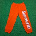 Supreme Satin Appliqué Sweatpants in Bright Orange