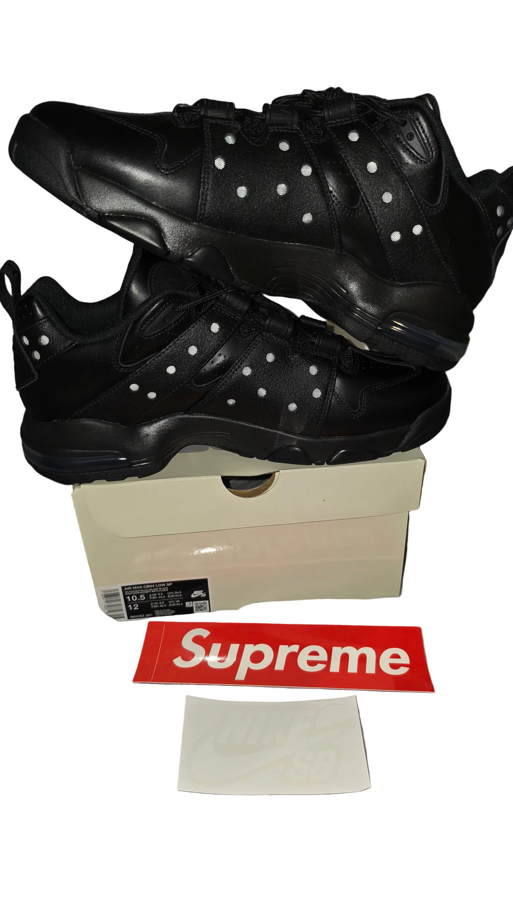 Supreme x Nike SB Air Max 2 CB '94 Low sneakers in Black, featuring a leather upper and perforated reflective mesh underlays.
