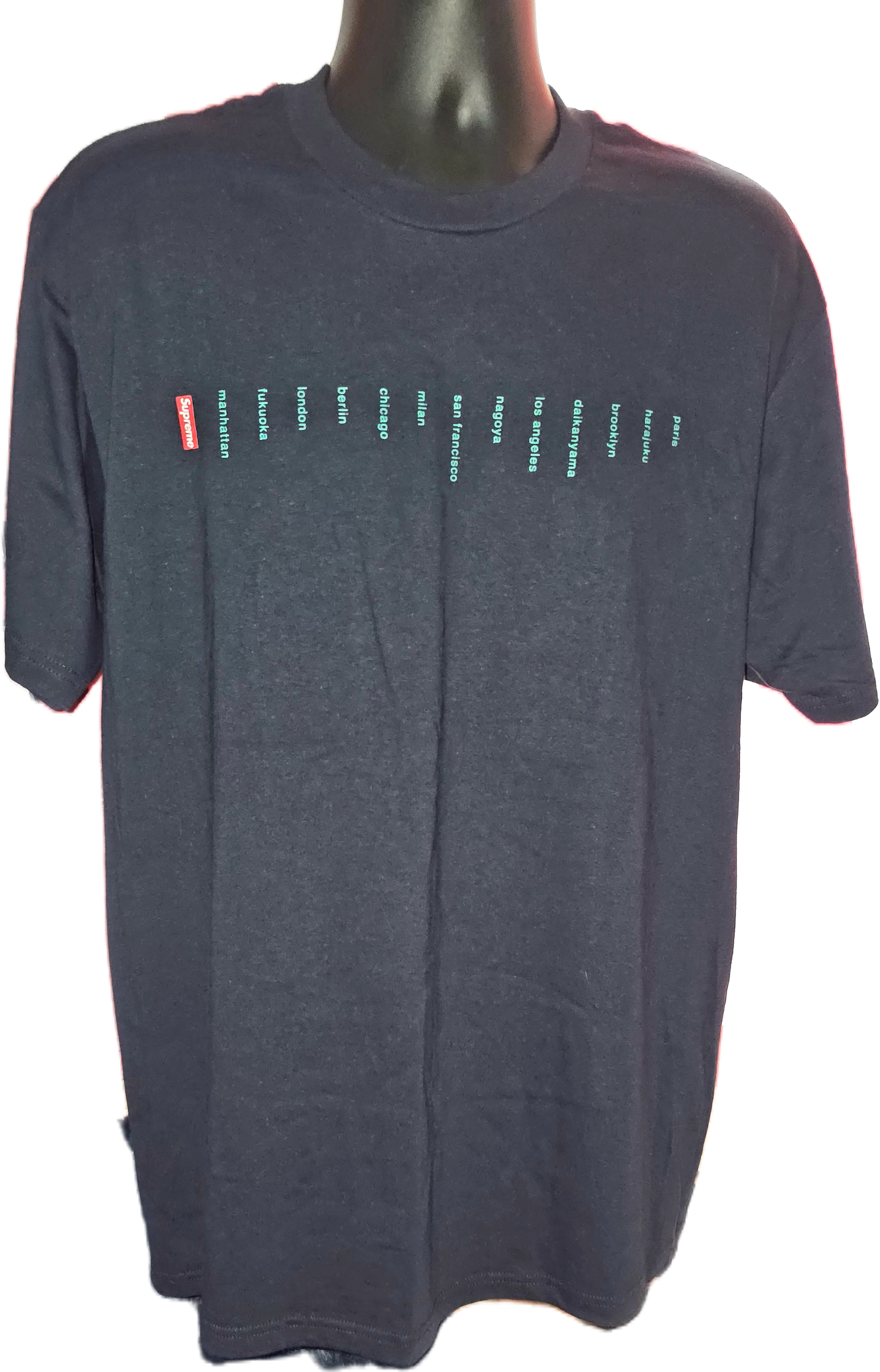 Supreme Location Tee in navy from the Spring/Summer 2023 collection, featuring a printed list of global store cities.