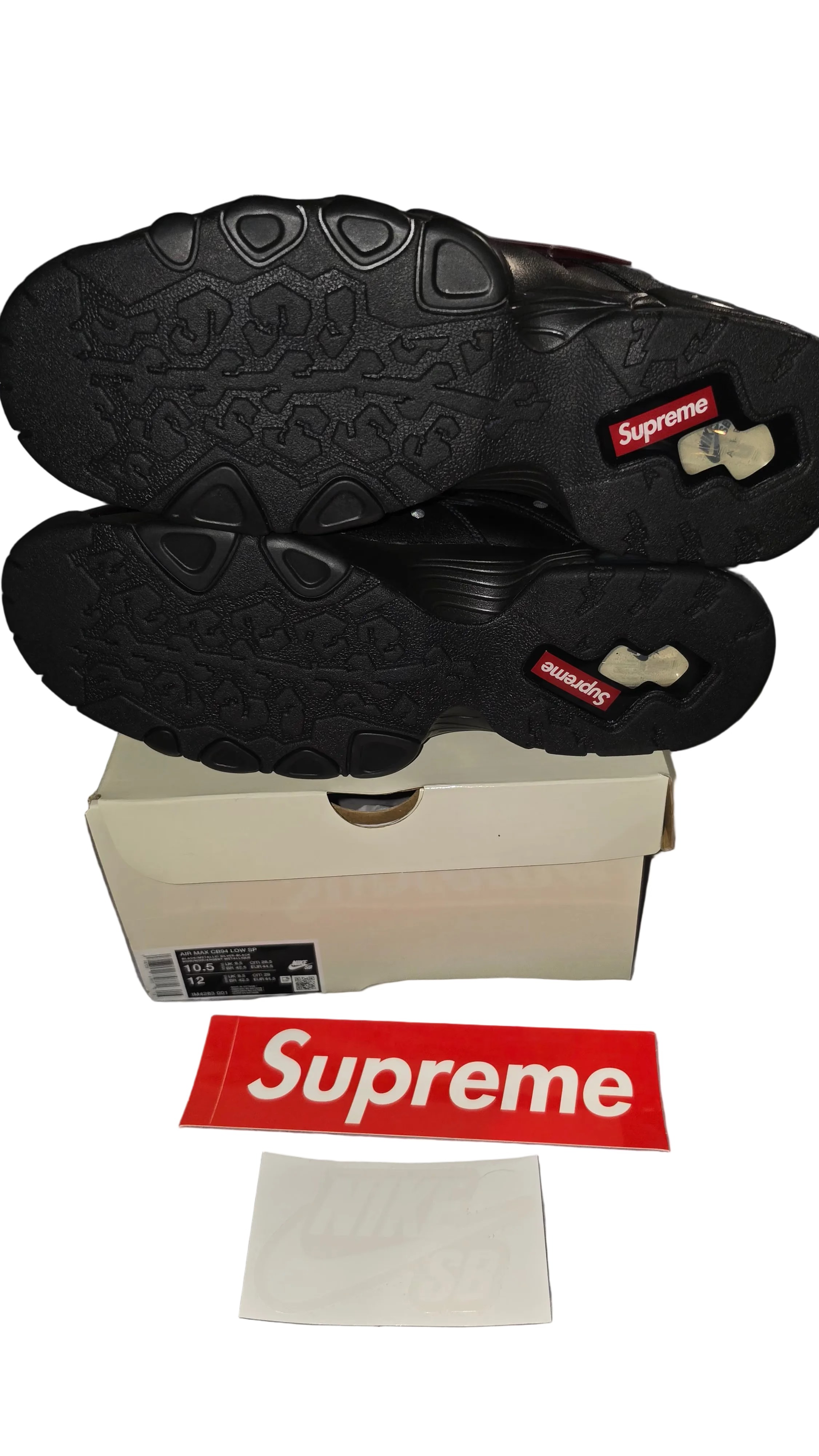 Supreme x Nike SB Air Max 2 CB '94 Low sneakers in Black, featuring a leather upper and perforated reflective mesh underlays.