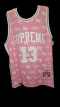 Pink Supreme x Mitchell & Ness monogram basketball jersey features tackle twill appliqué and a matching woven logo label at the lower front.Release Date: May 07, 2026