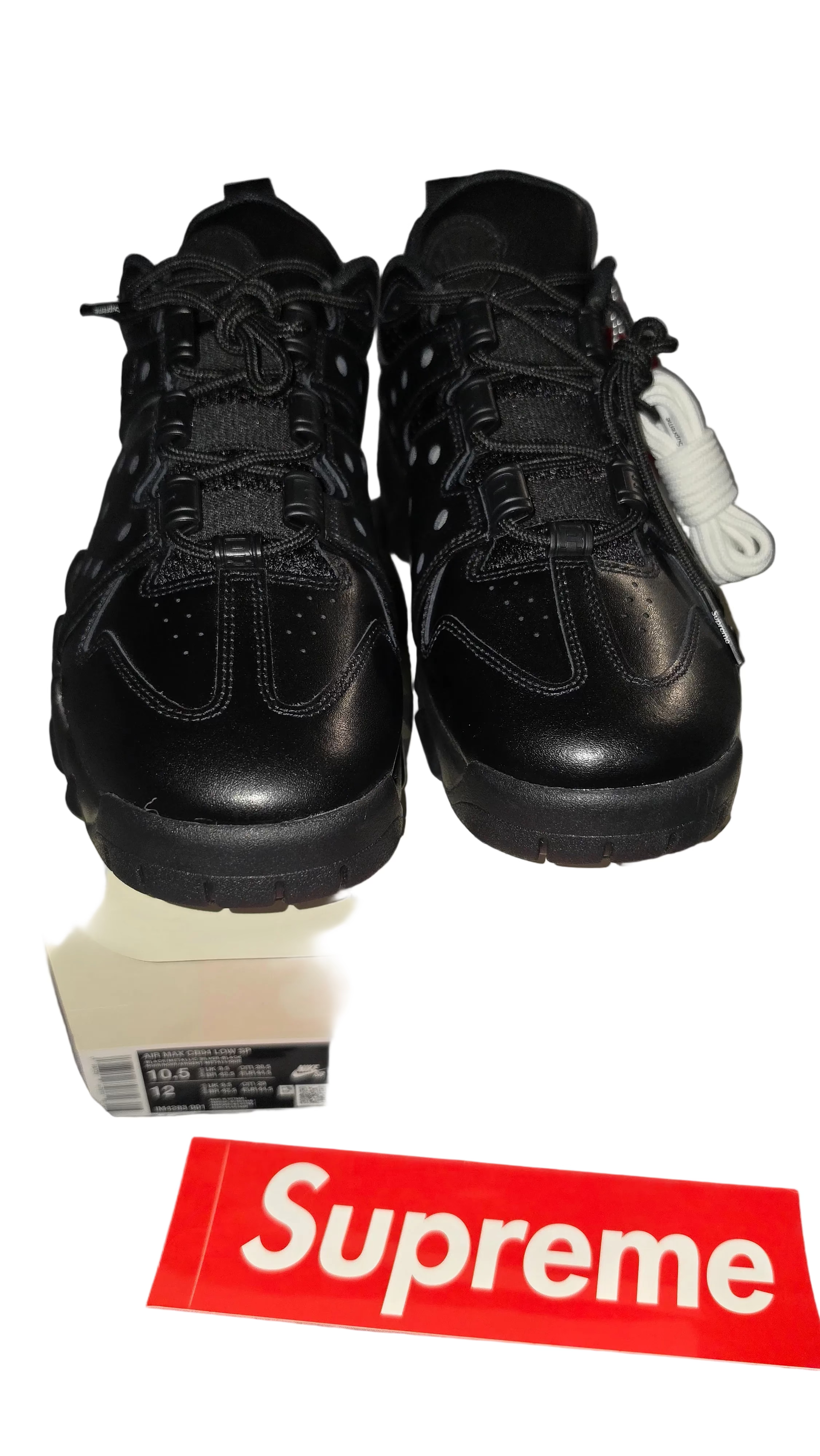Supreme x Nike SB Air Max 2 CB '94 Low sneakers in Black, featuring a leather upper and perforated reflective mesh underlays.